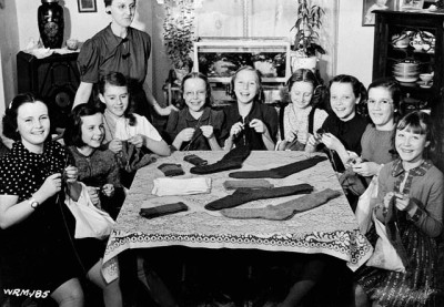  The "Little Happy Gang" children's knitting club, who are knitting for Canadian soldiers and for the Canadian Red Cross Society. (Photo Credit: Library and Archive of Canada)